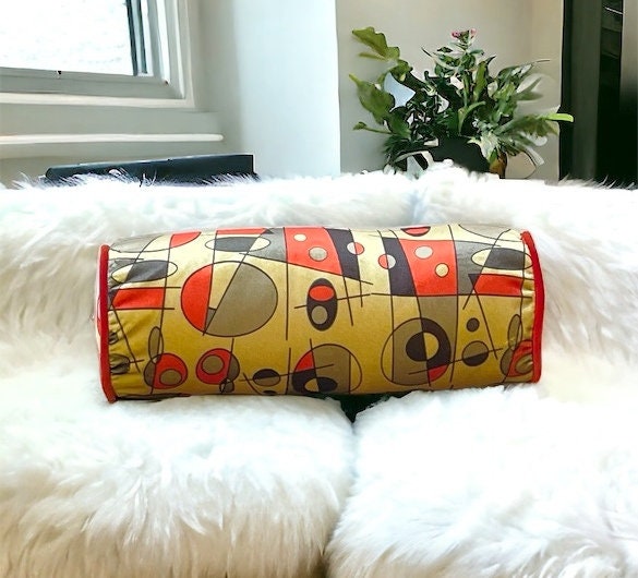 Vibrant orange and yellow geometric pattern velvet bolster pillow cover